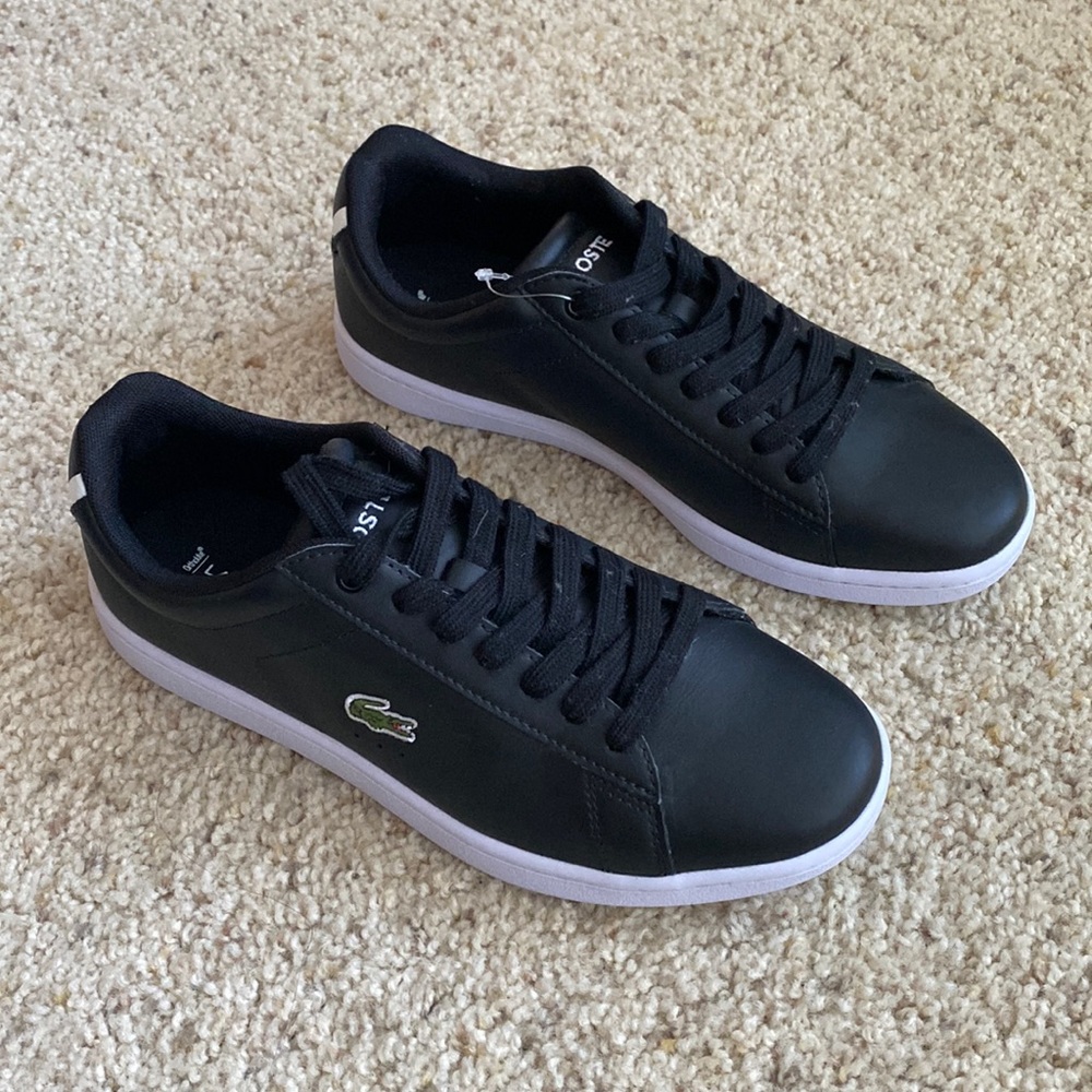 Never worn black Lacoste sneakers Carnaby Evo Womens